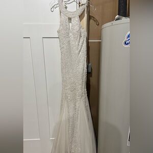 White beaded Sherri hill gown